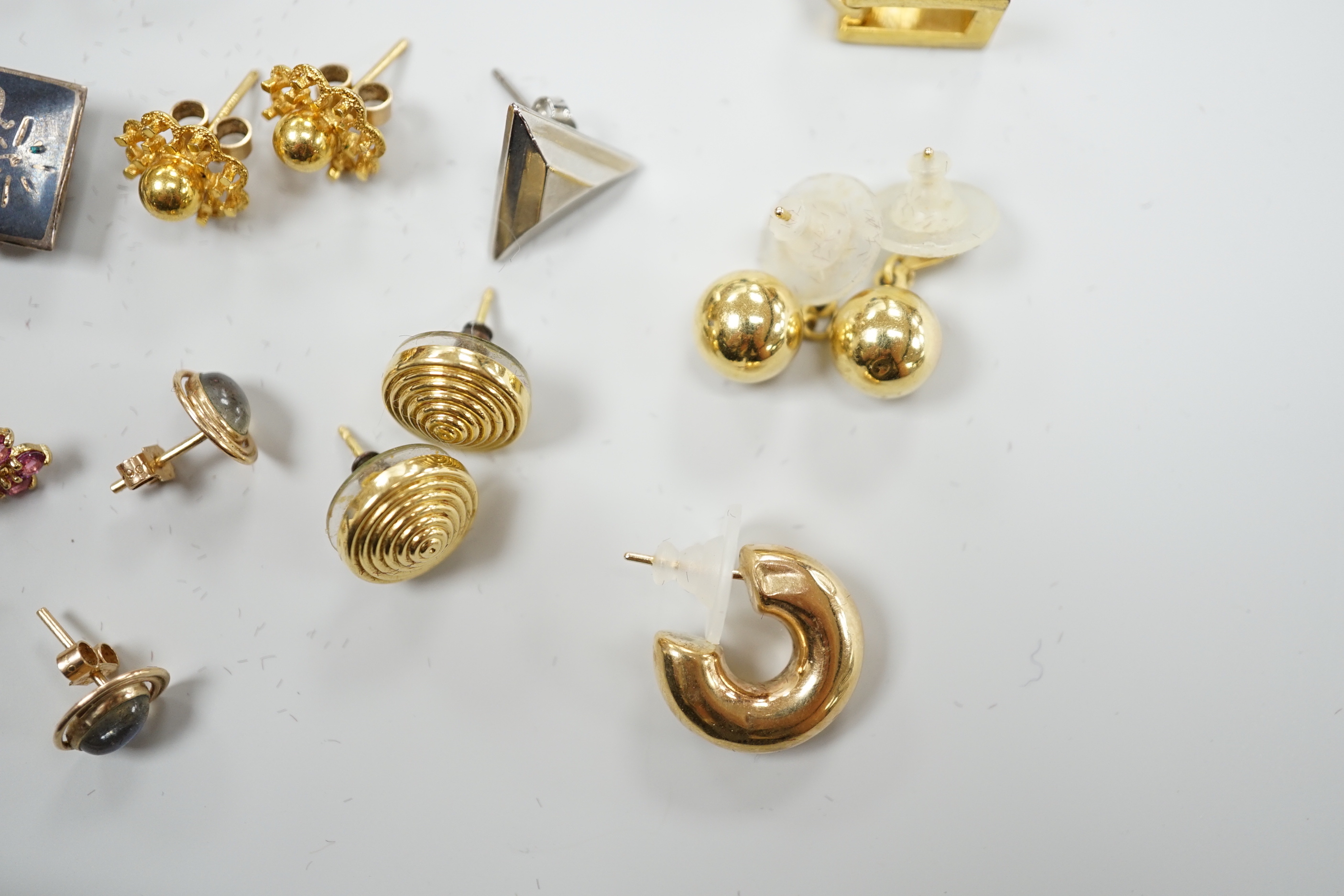 A modern pair of 9ct gold, gold, ruby and diamond earrings, boxed and nine other assorted pairs of earrings and two odd earrings.